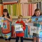 Karis, Ned and Isabelle with their projects 